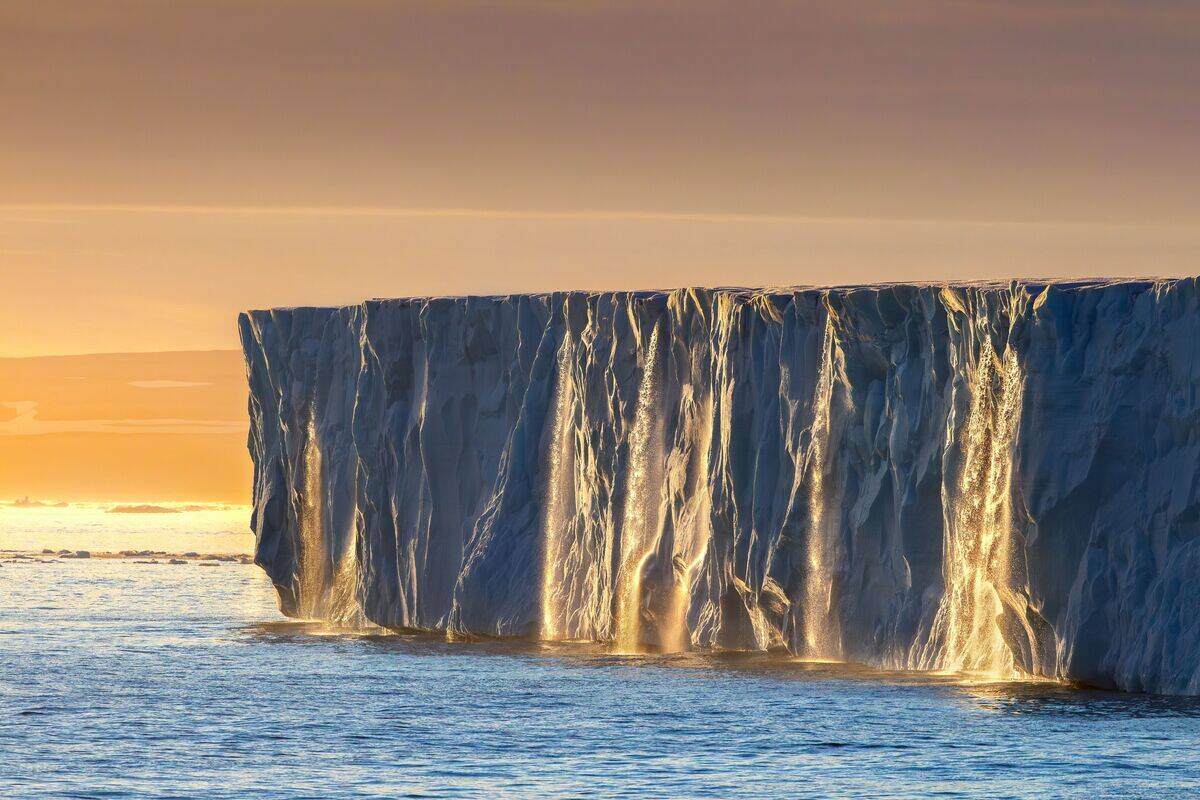 Waterfalls at edge of the Brasvellbreen glacier.