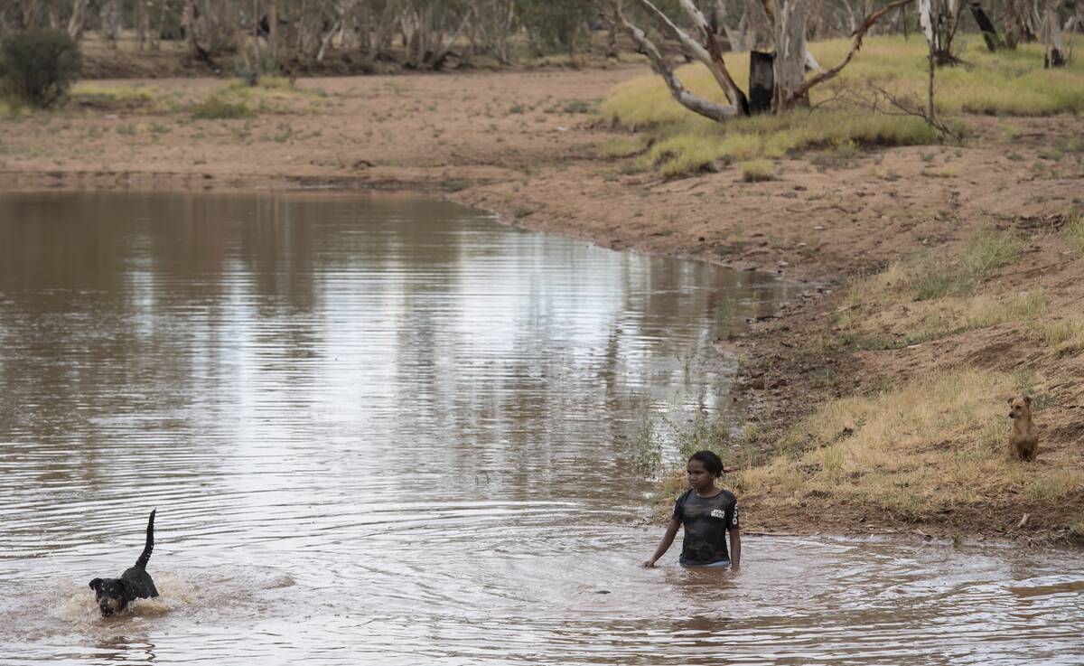 Aboriginal Kids Swimming in Todd River in Alice Springs