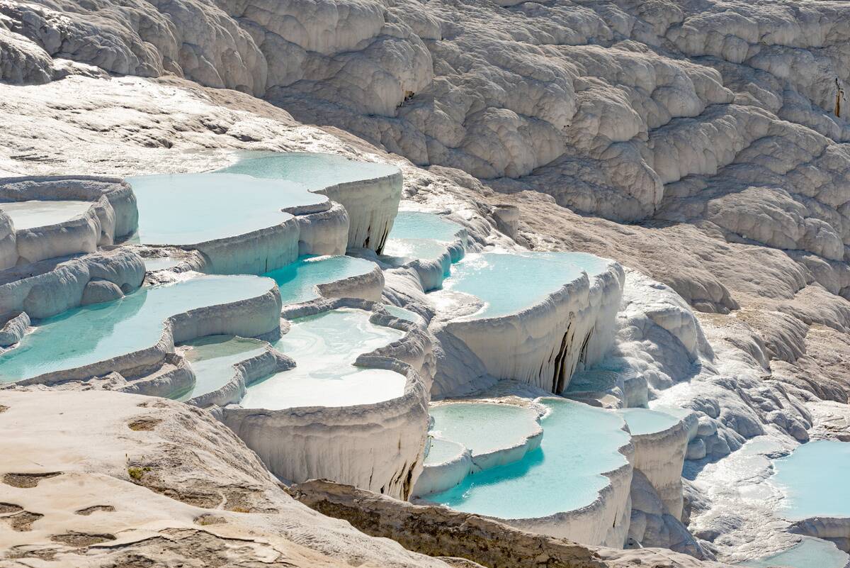 Pamukkale Travertine Terraces, amazing aqua blue pools of...