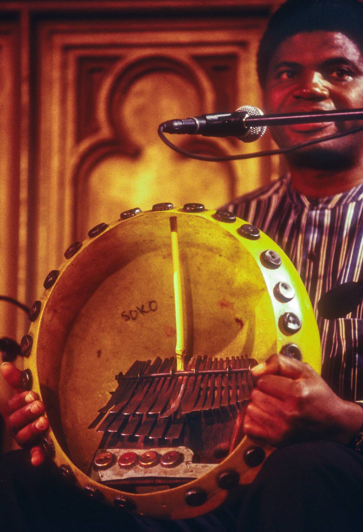Zimbabwean musician Cosmas Magaya displays his mbira at a World Music Institue concert.