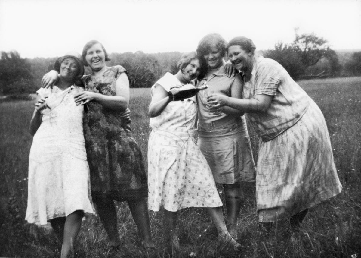 A group of woman enjoy their wine, ca. 1930