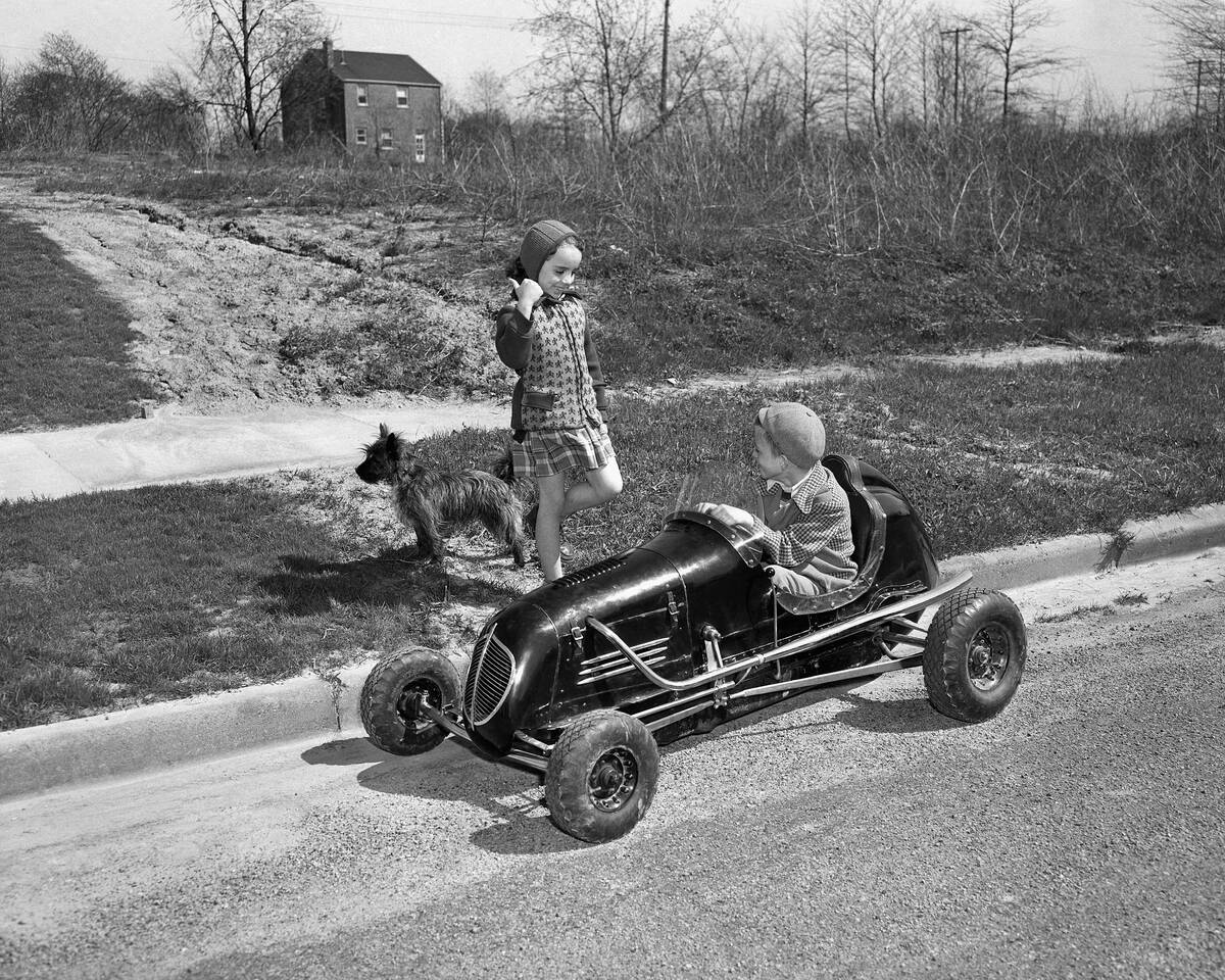 Friend Hitching a Ride from Boy with Toy Car