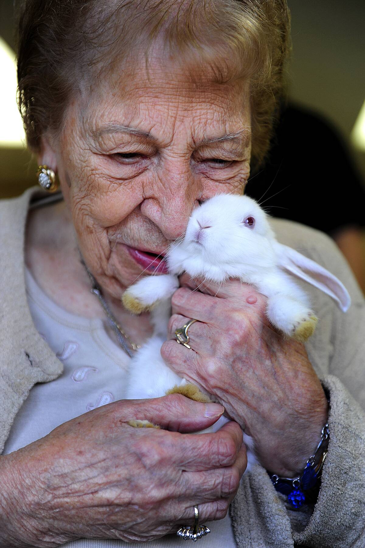 Grace Palmigiano,94, with bunny rabbit during Pet Therapy se