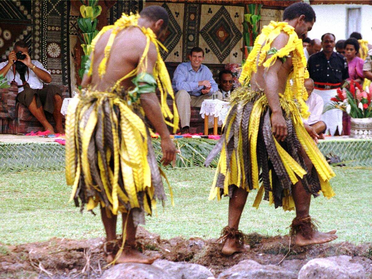 HRH Prince Andrew watches a Firewalking ceremony p