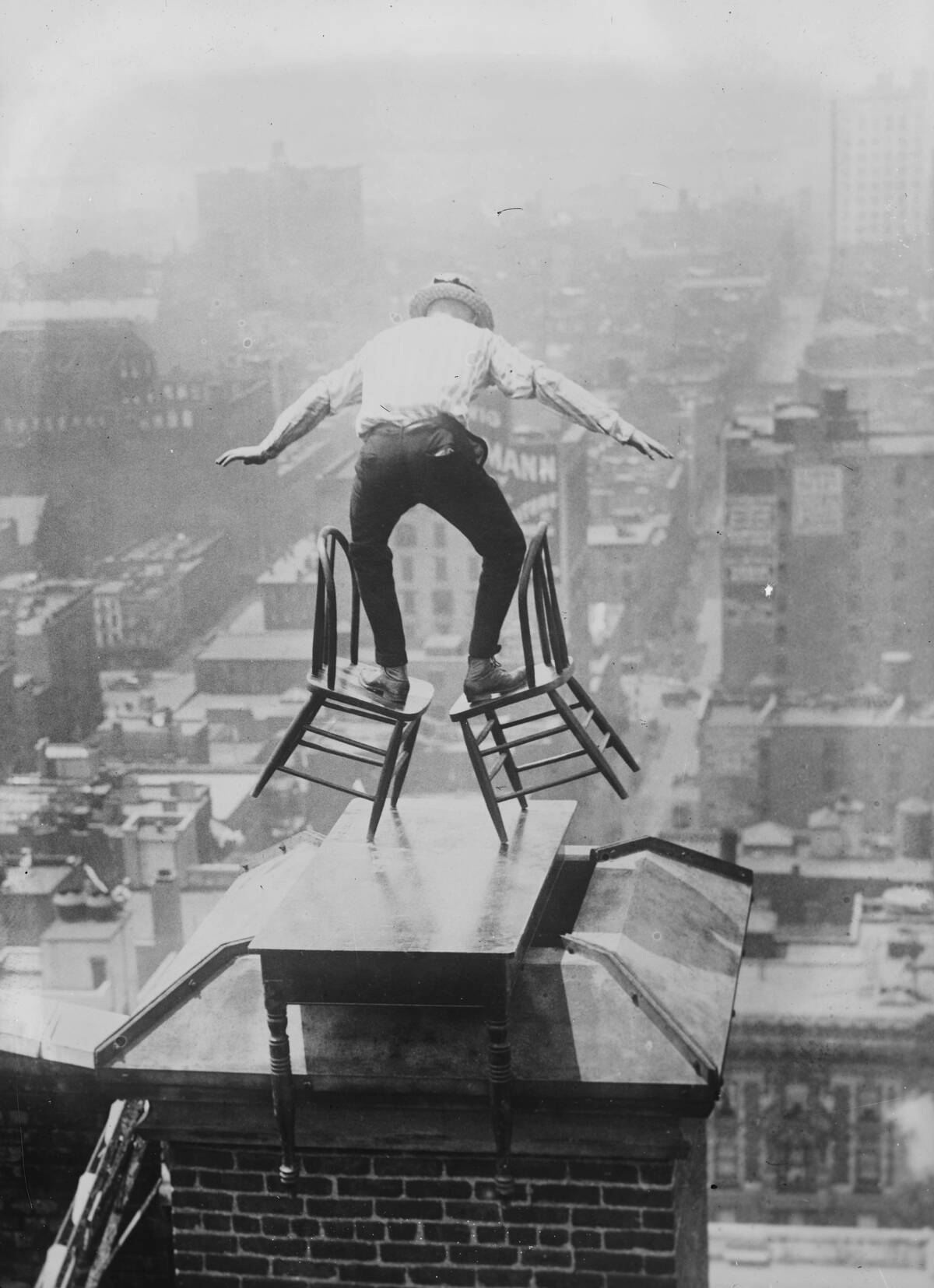 Reynolds performs a balancing act on roof in New York City