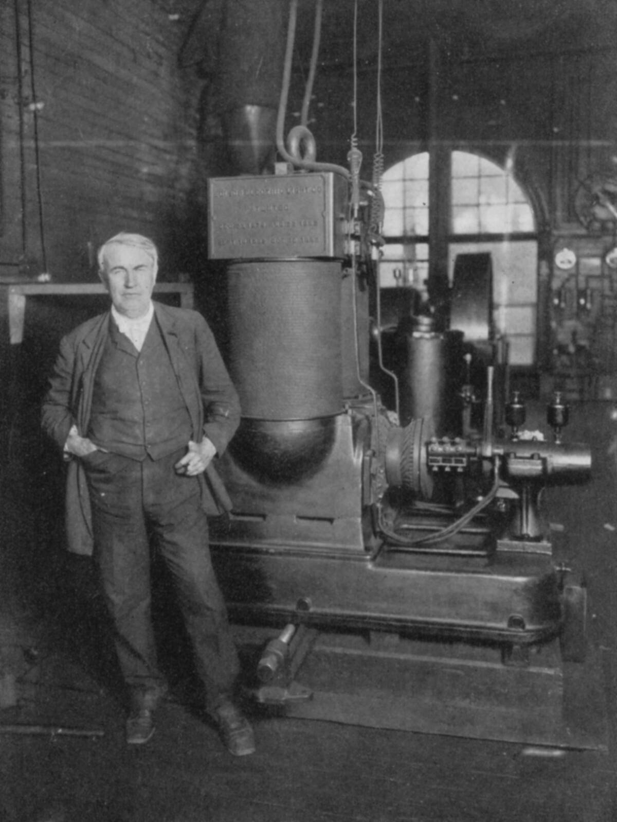 Thomas Alva Edison (1847-1931) American inventor, with his first dynamo for producing electric light.