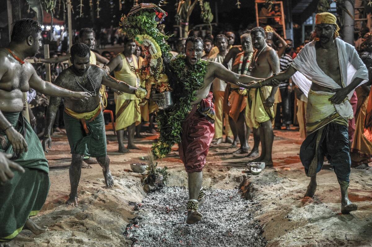 TOPSHOT-MALAYSIA-RELIGION-FESTIVAL-THIMITHI