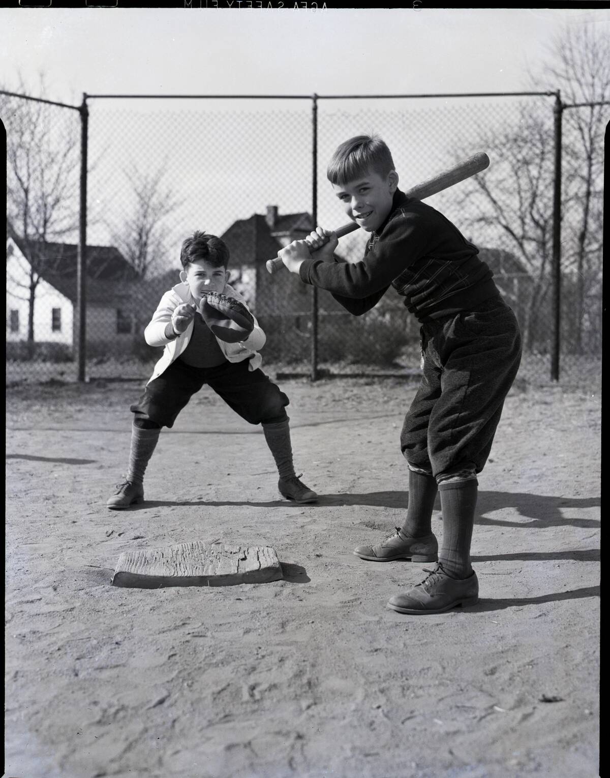 Two Boys Playing Baseball