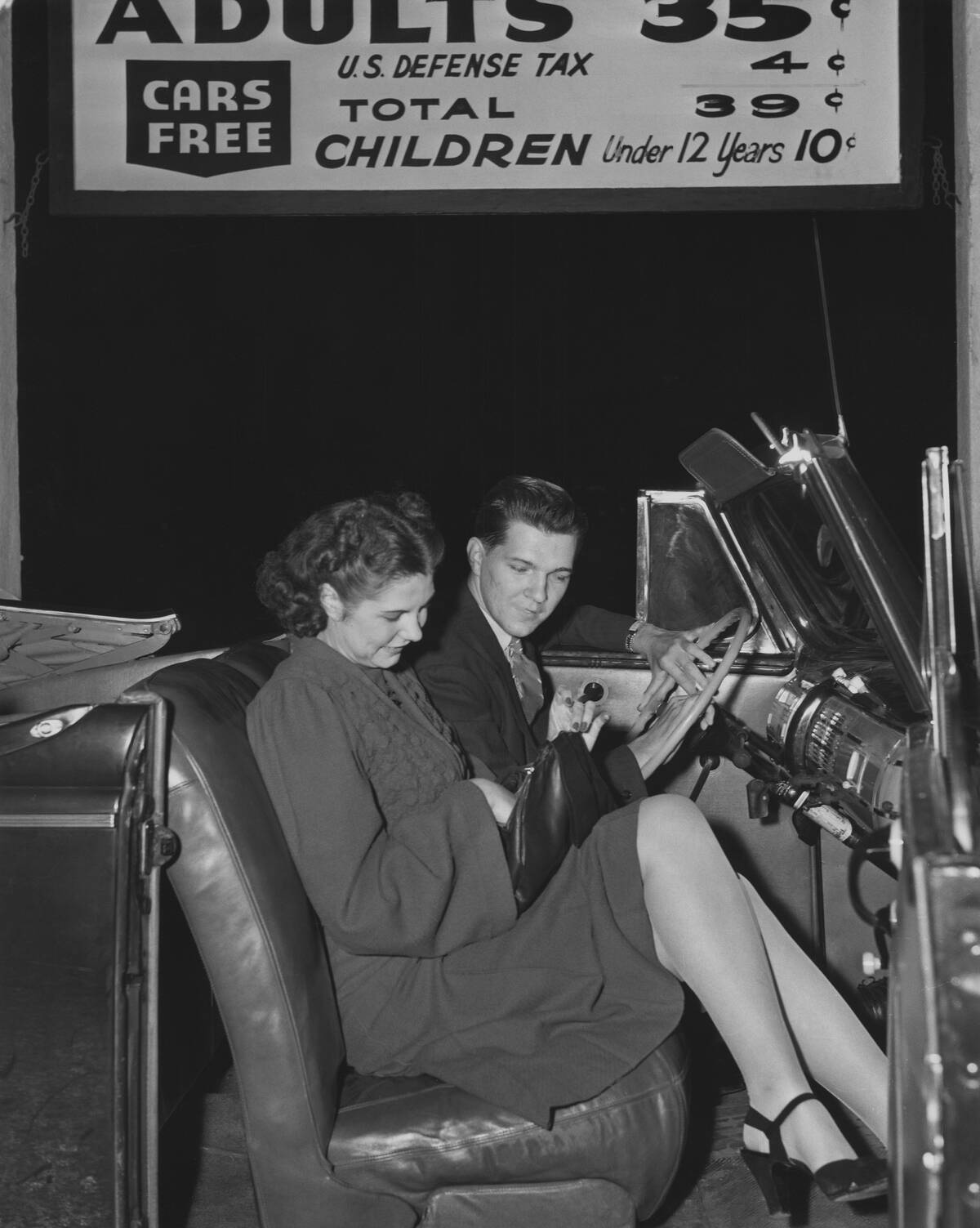 Young Couple At The Drive-In