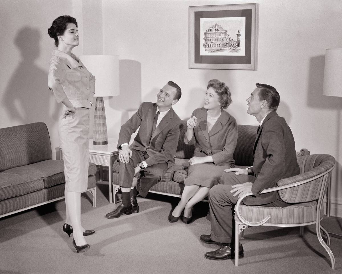 1950s Brunette Woman Standi...