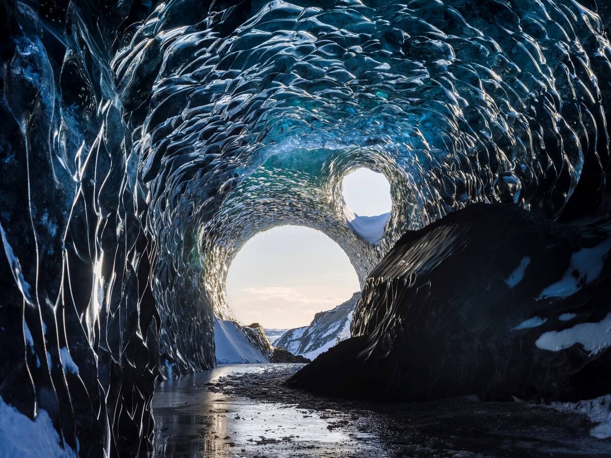 Ice cave at the northern shore of glacial lagoon Joekulsarlon in glacier Breidamerkurjoekull in Vatnajoekull NP. Europe, Northern Europe, Iceland